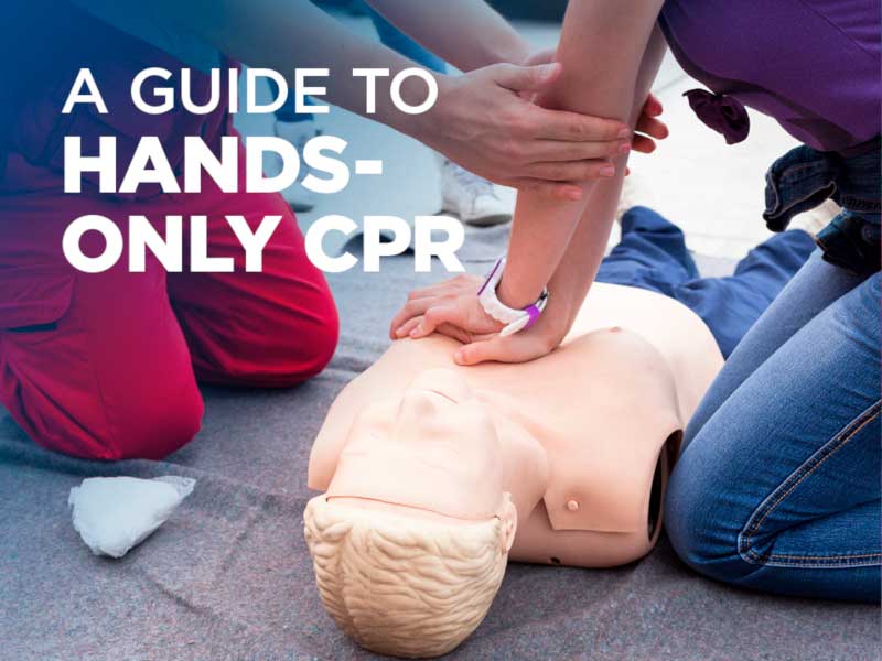 Someone training someone else in how to do CPR