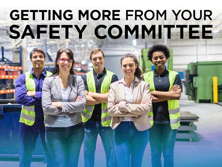 Safety committee posing for a picture in a factory