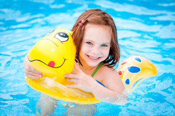 Kid at a swimming pool on a floaty mobile view